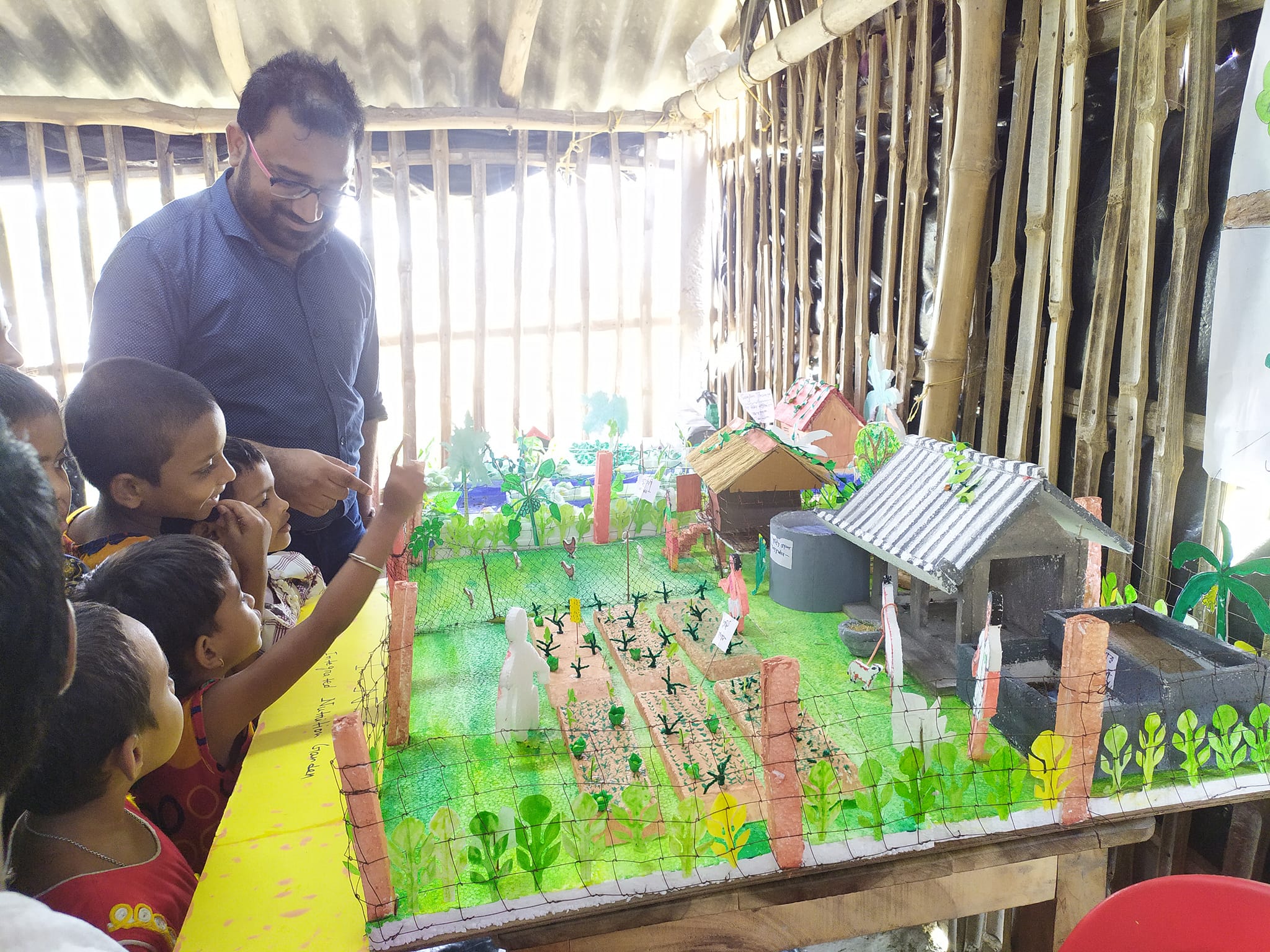 Children of our Sundarban Badaban Bharati Education Centre of SAI display a model village on the occasion of World Environment Day.