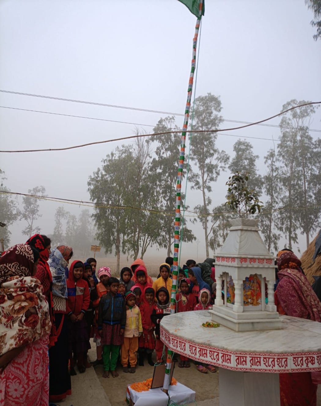 Students and teachers of the Barnaparichay Education Centre celebrate the 127th birth anniversary of Netaji Subhas Chandra Bose