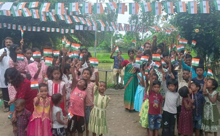 Students of Nonamatir Pathsala, Kumirmari during flag-hosting ceremont on 88th India's Independence Day.
